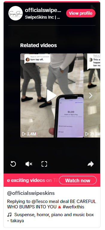 Man holding RFID wallet in airport